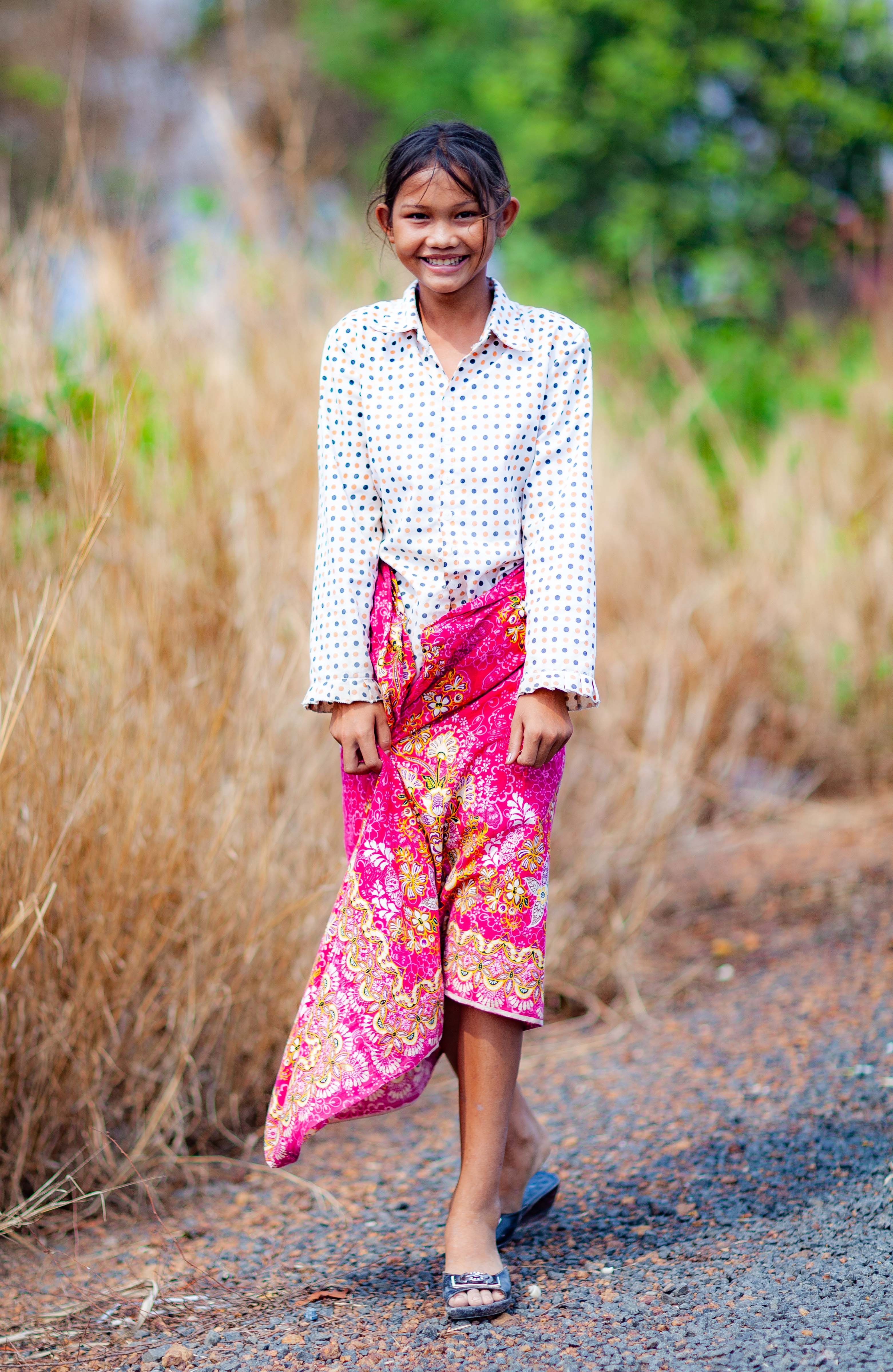 Cambodia, Kracheh Prov, Girl Walking, 2011, IMG 0826