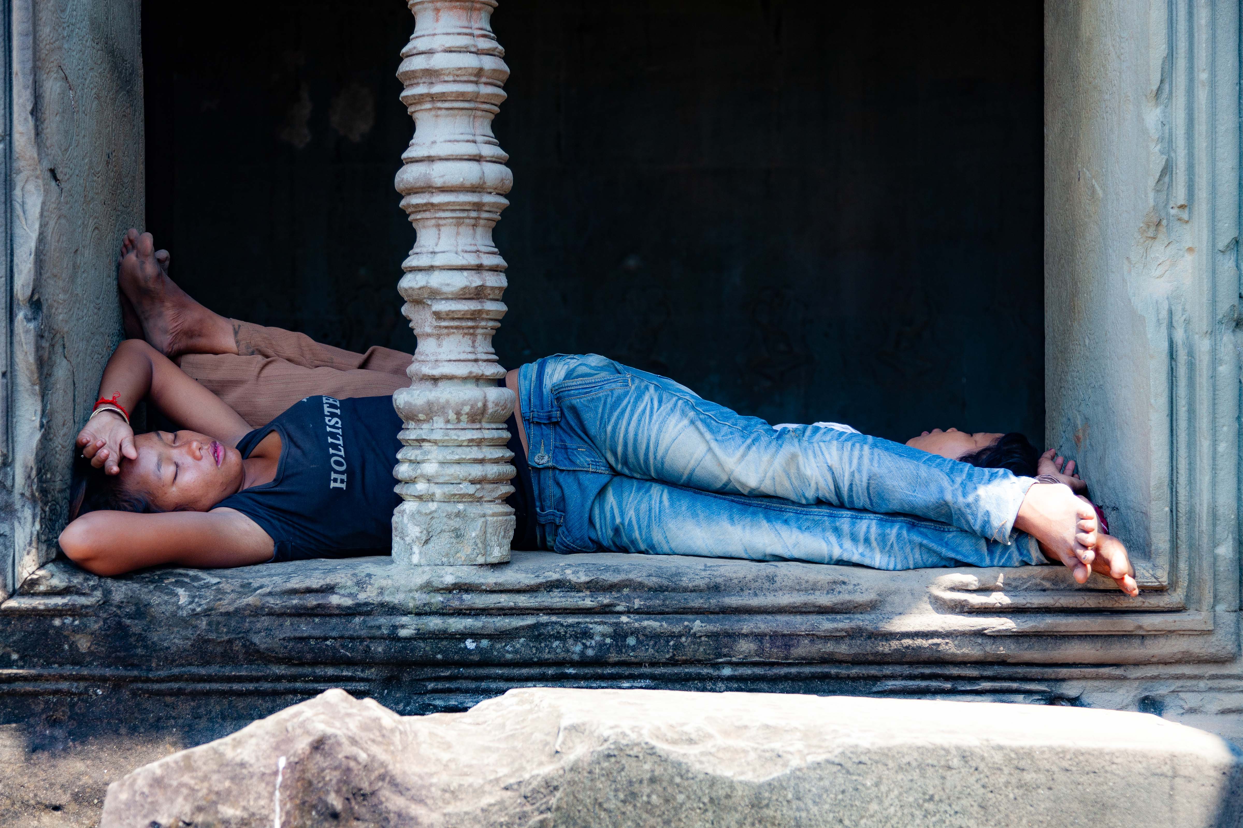 Cambodia, Siem Reab Prov, Sleeping Girls in Angkor Wat, 2011, IMG 0192