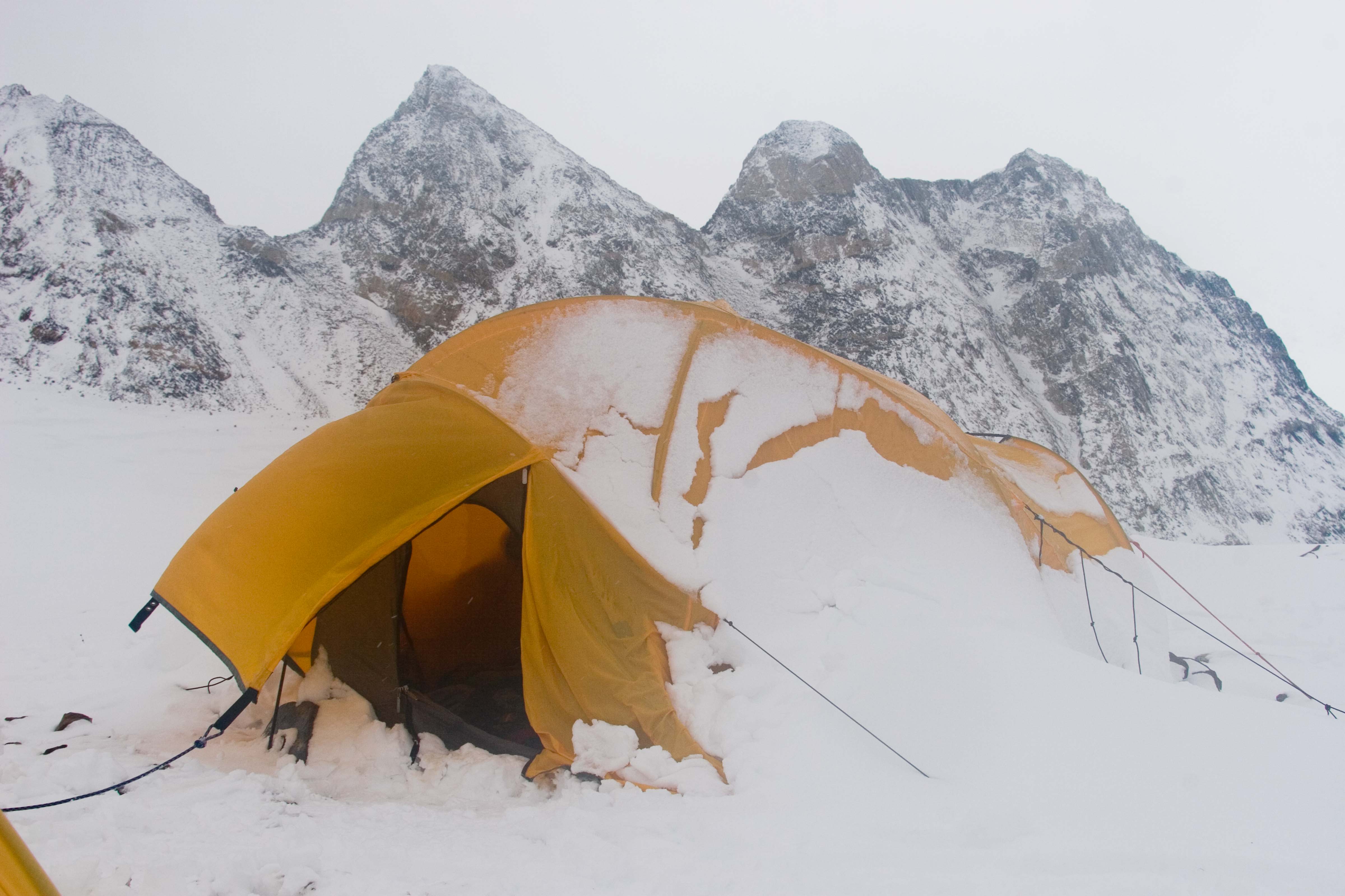 Greenland, Warming Island, off coast of Liverpool Land, Tent After Storm And Pinnacles, 2006