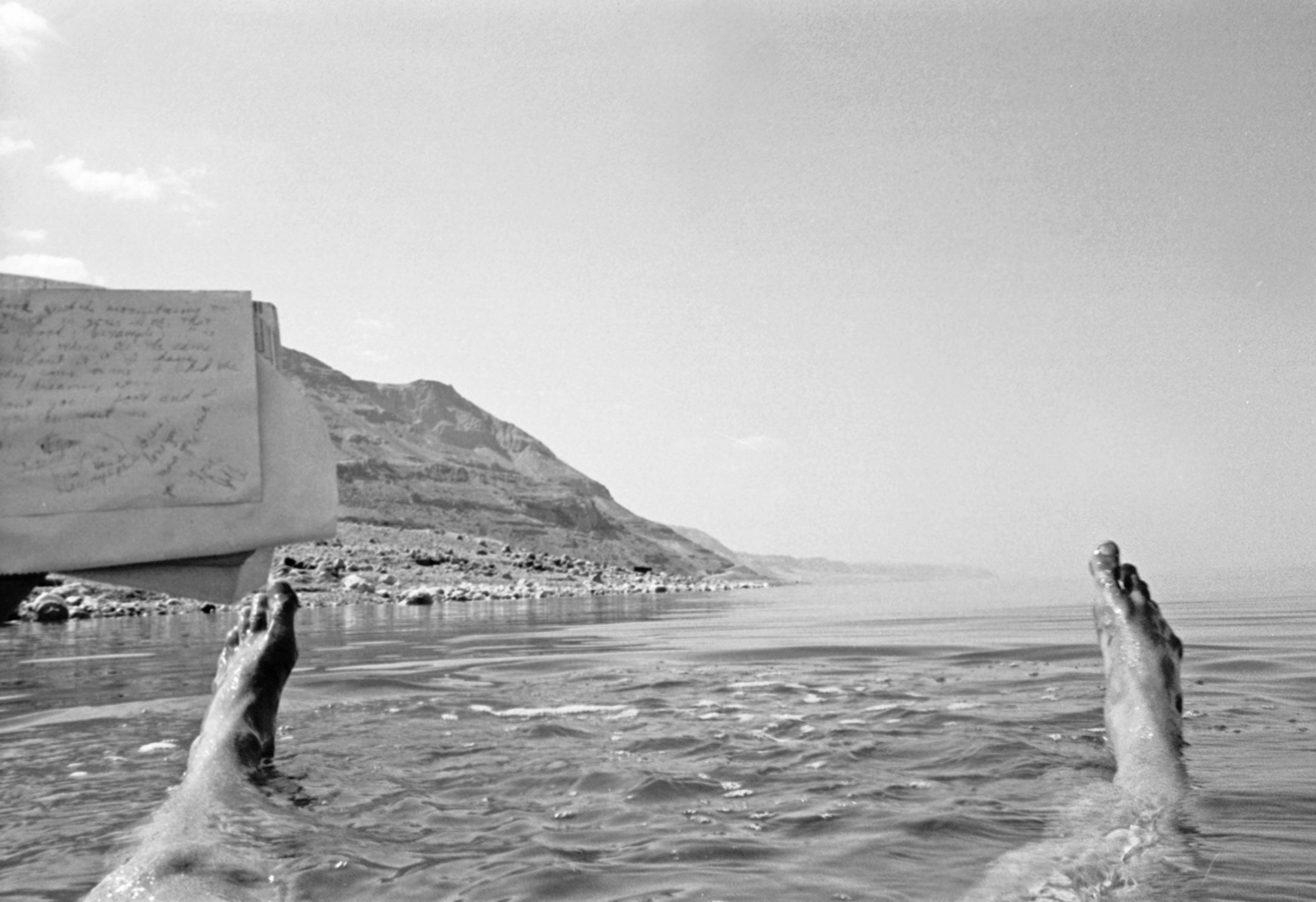 Palestine, Jeff Shea Writing Love Letter While Floating In Dead Sea, 1984