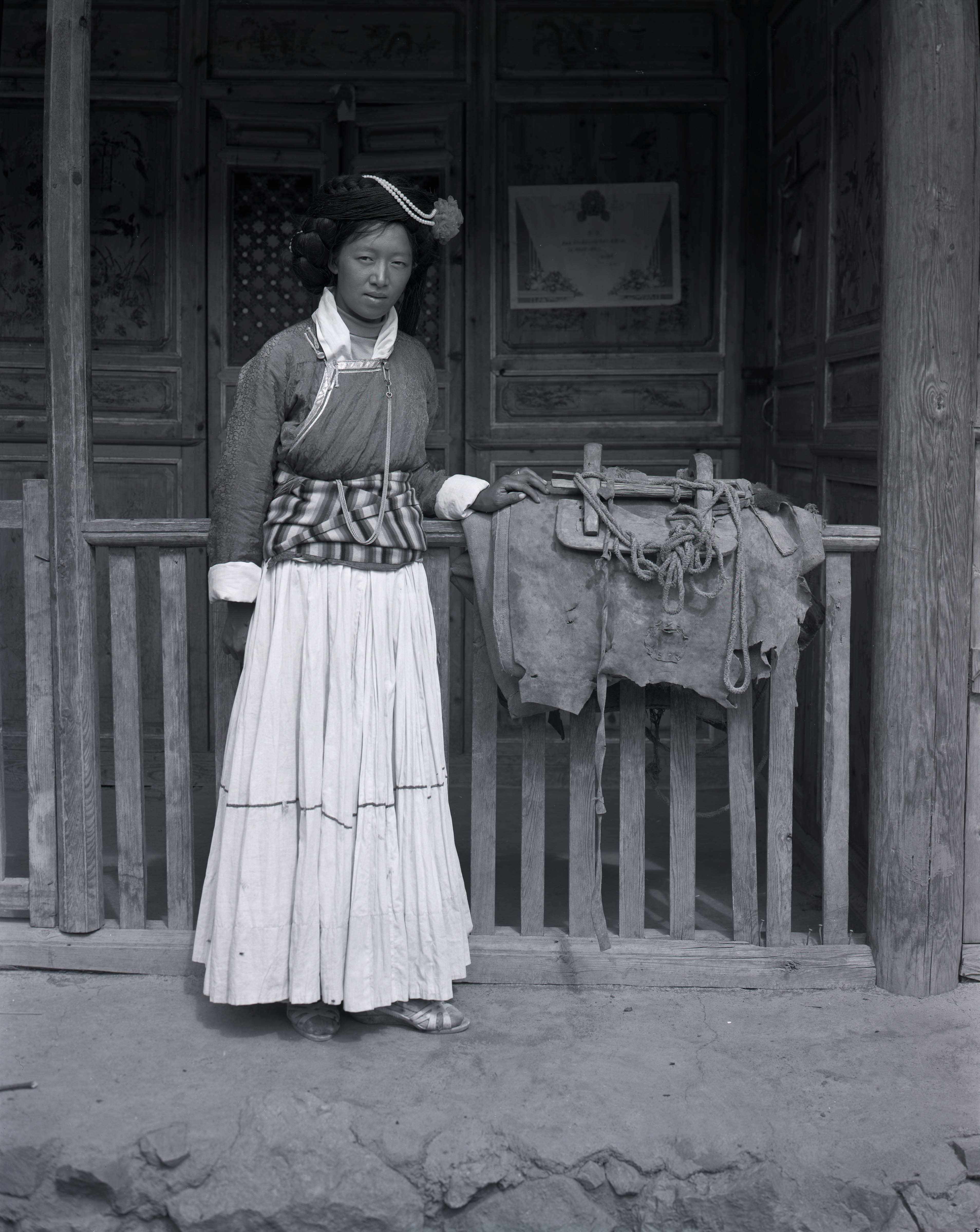 China, Yunnan Prov, Moshuo Woman With Saddle, 1991, N040