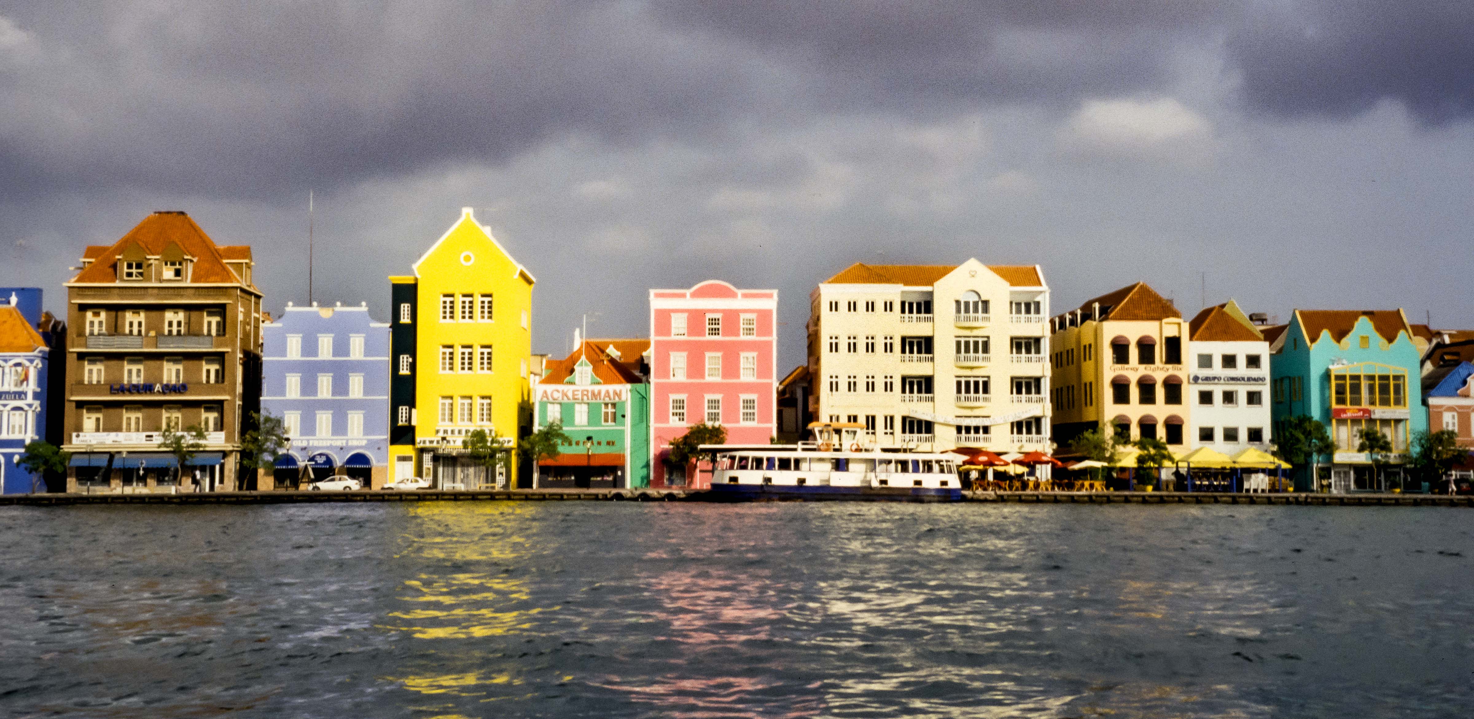 Curacao, Waterfront Promenade, 2000 – This section of waterfront in Curacao is notable because of its varied architecture and color.