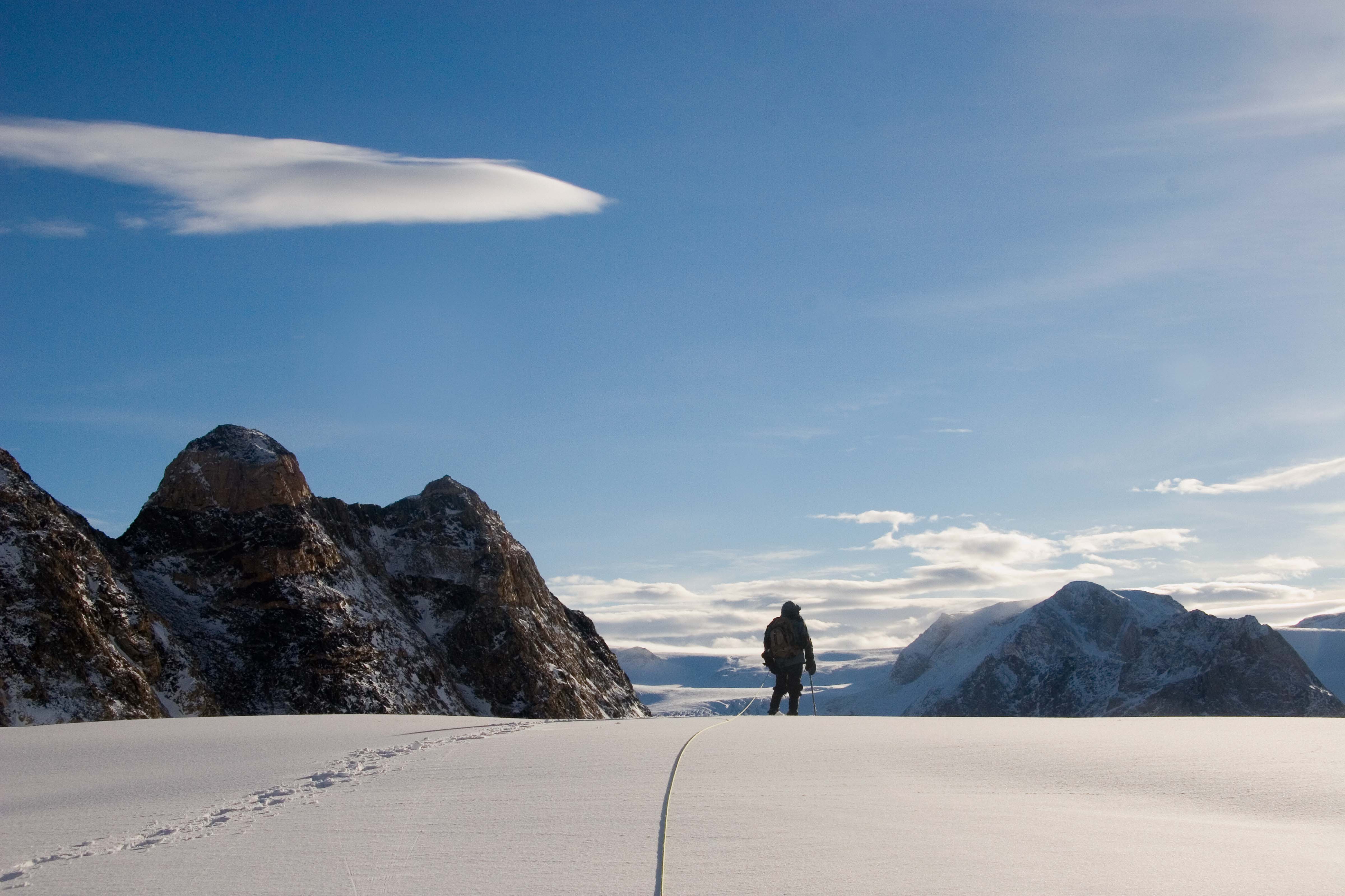 Greenland, Warming Island, off coast of Liverpool Land, Dennis Schmitt Leads Across Glacier, 2006