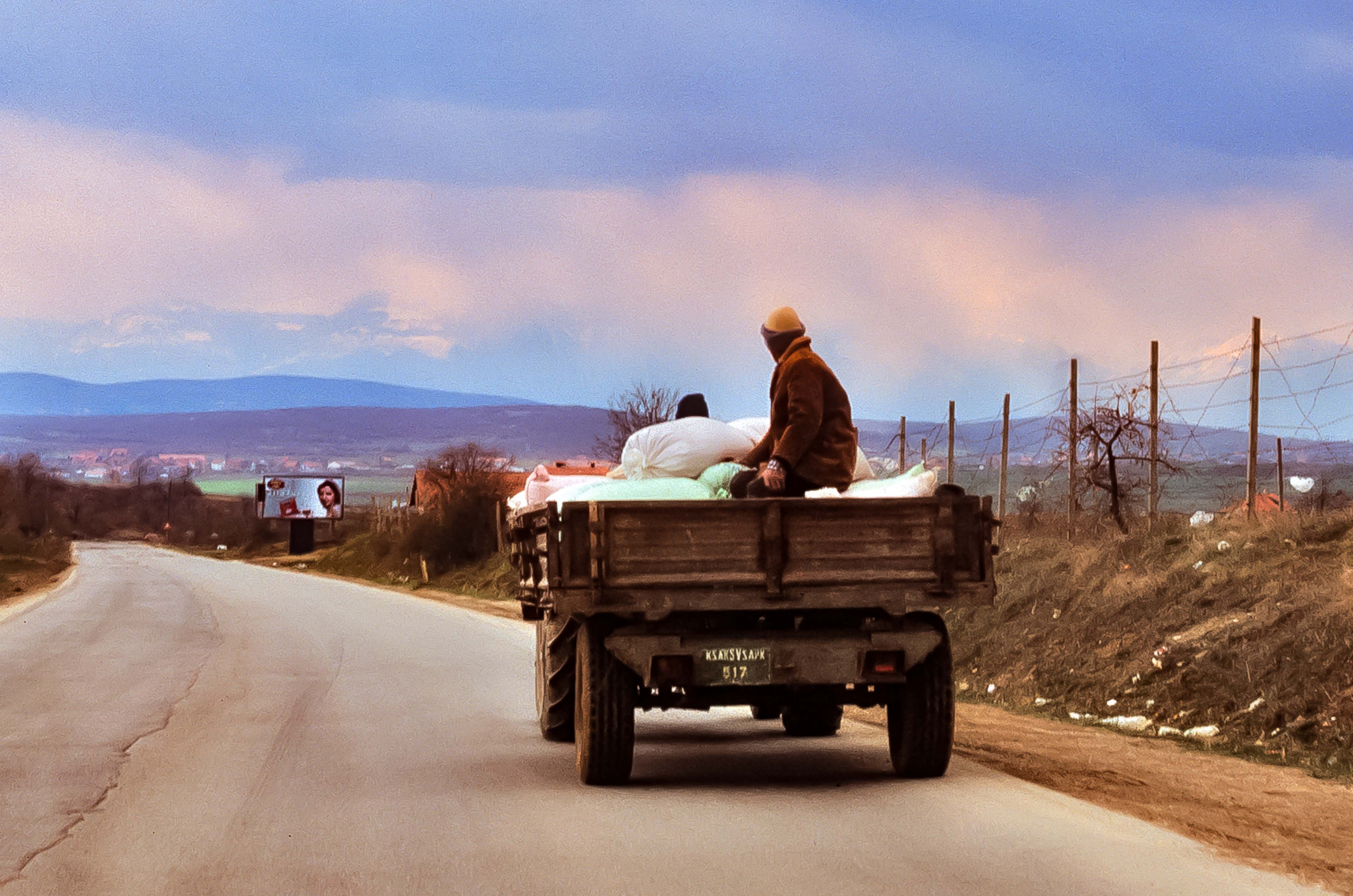 Kosovo, Riding The Back Of The Truck, 2003
