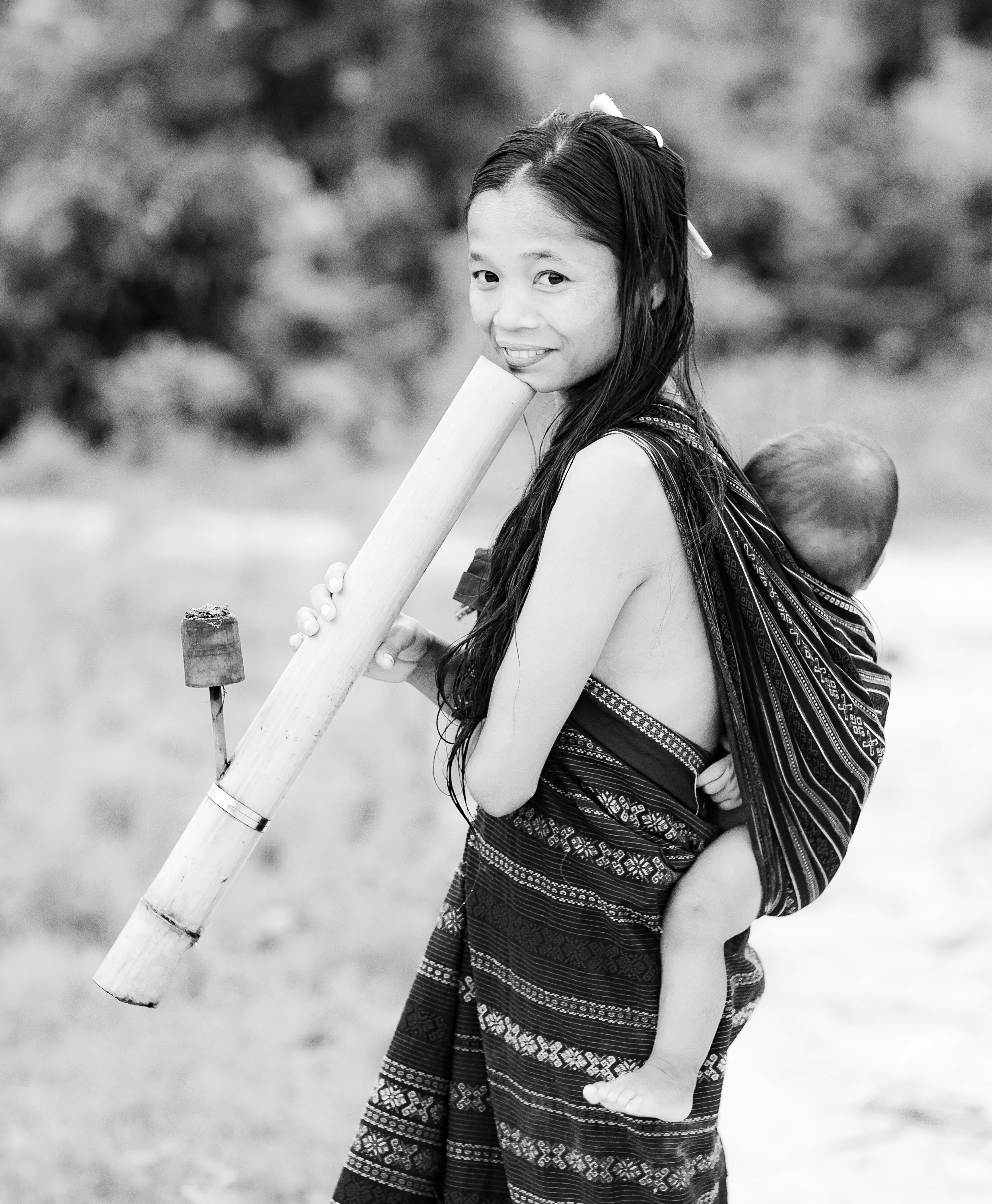 Laos, Xekong Prov, Woman With Pipe And Child, 2011, IMG 3967BW