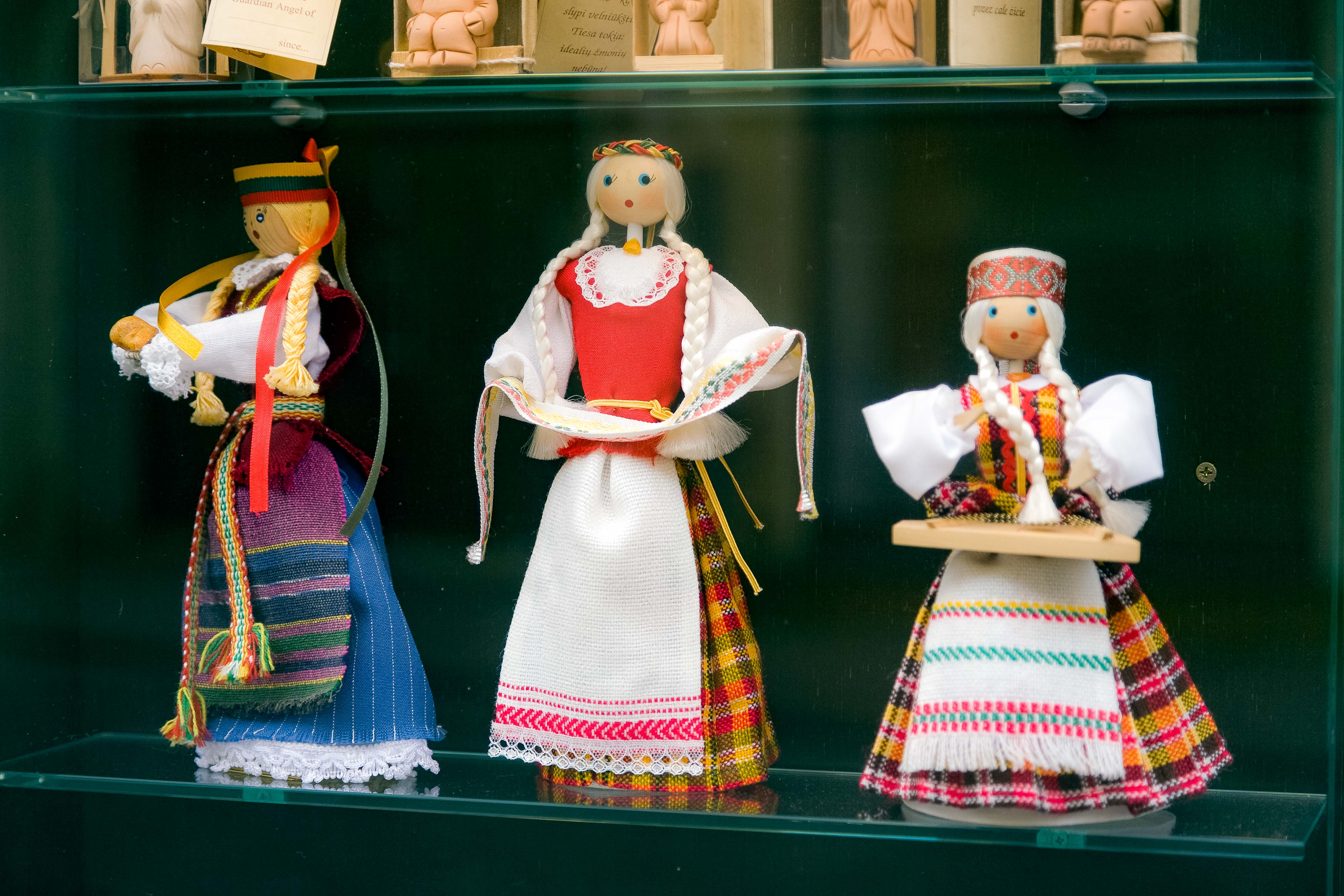 Lithuania, Vilnius, Three Dolls In Window, 2010, IMG_3100