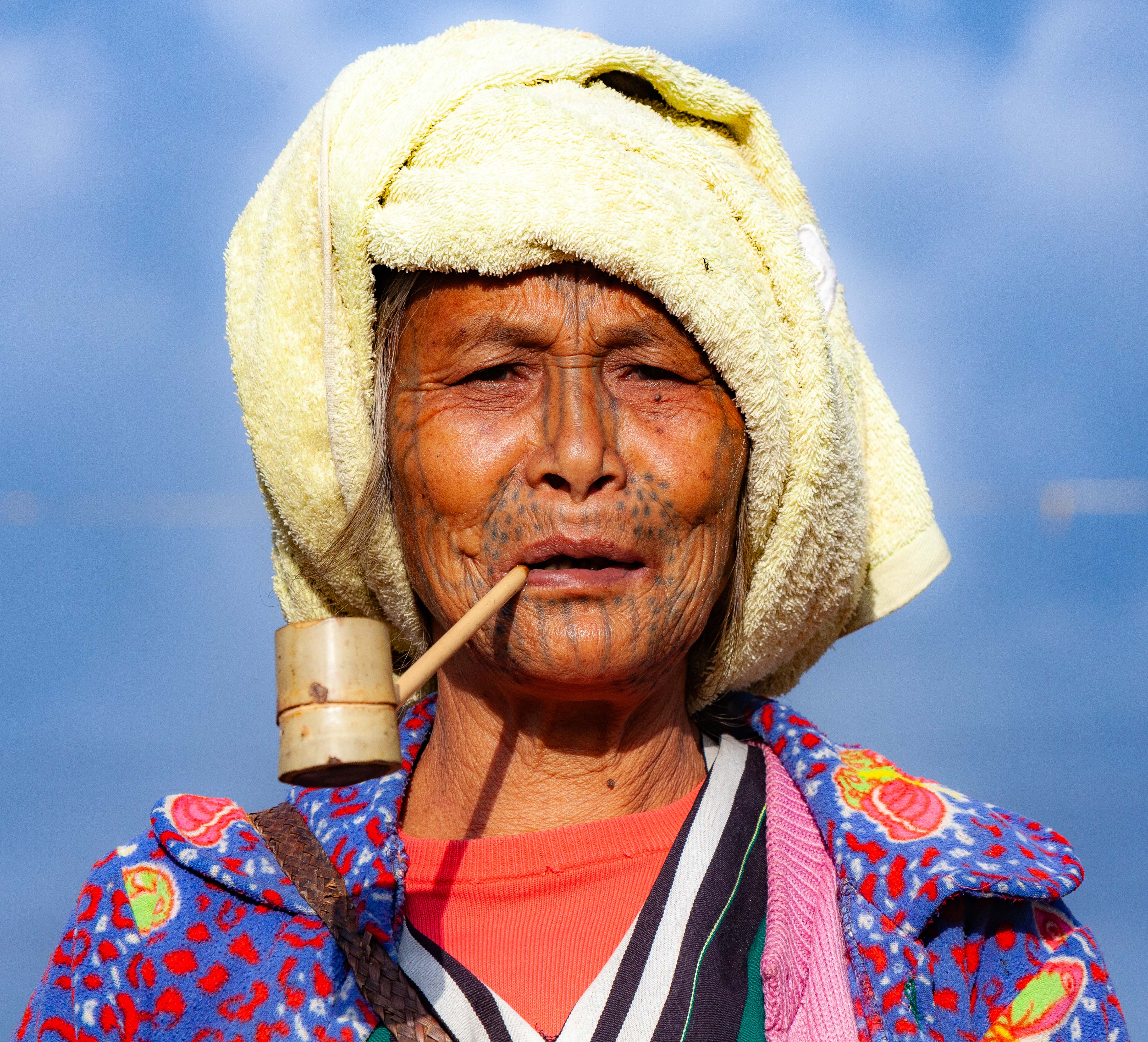 Myanmar, Chin Prov, Tattoo-Faced Woman With Pipe, 2012, IMG 2584