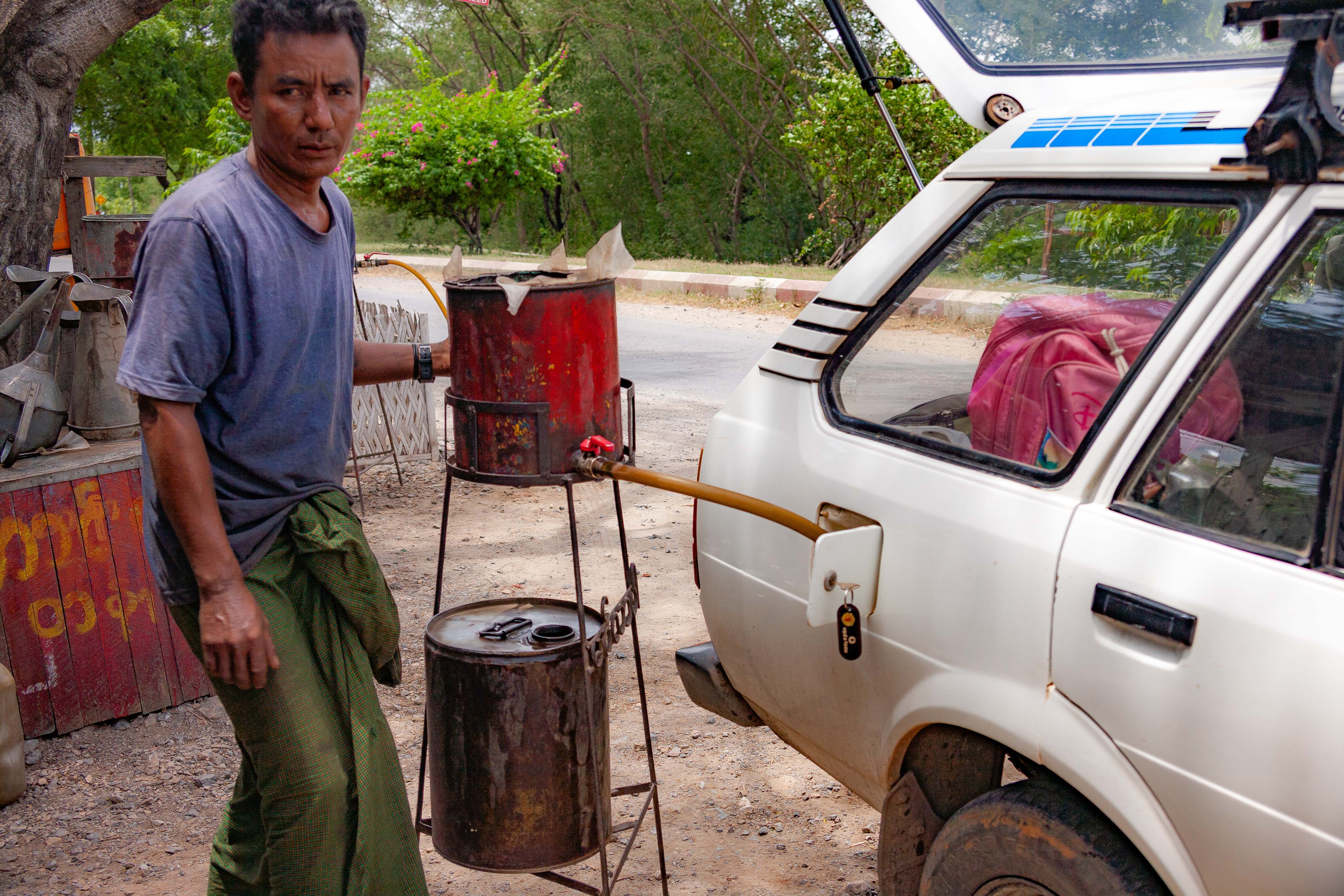 Myanmar, Mandalay Prov, Buying Petrol, 2009, IMG 4149