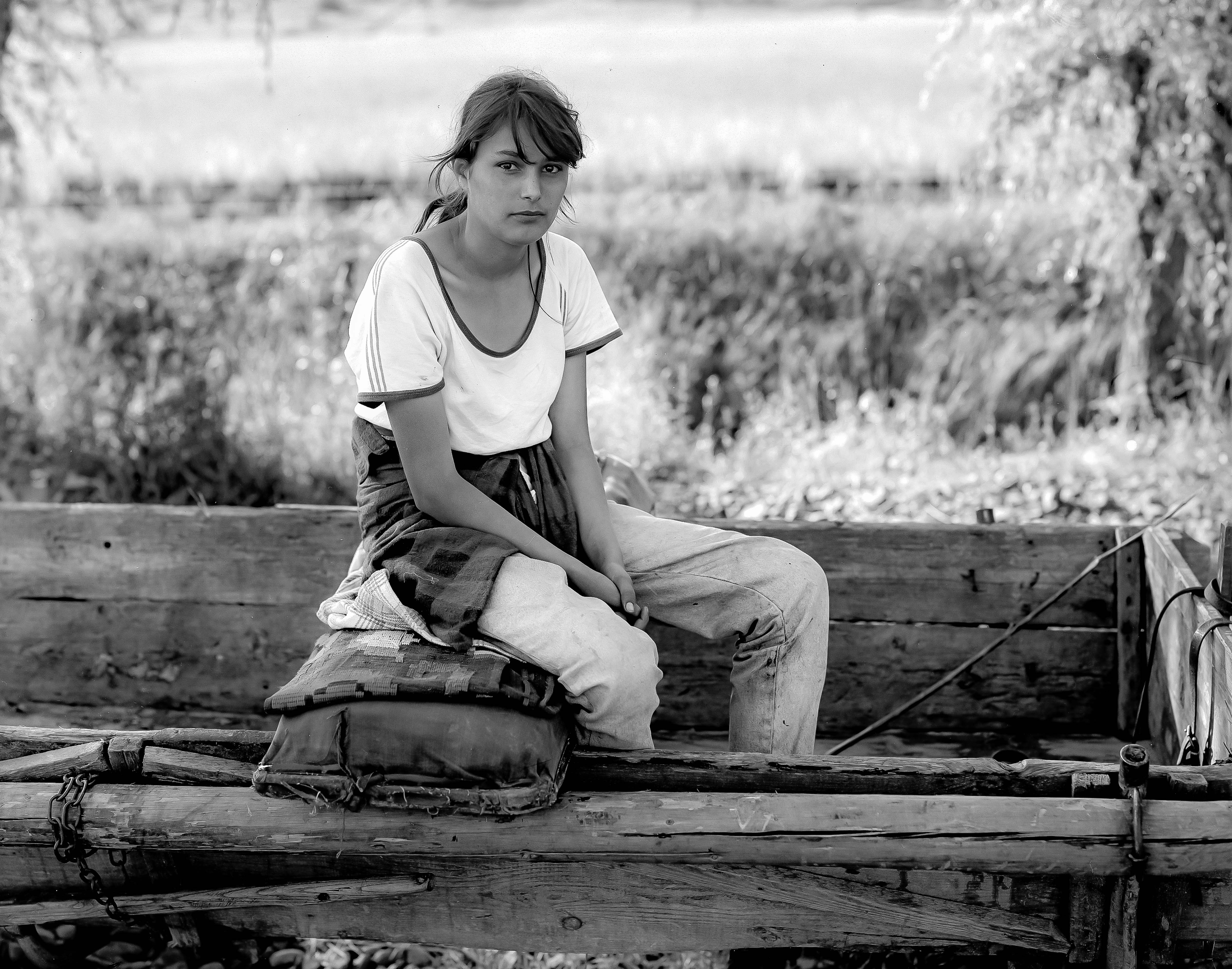 Romania, Farm Girl Sitting On Wagon, 1997