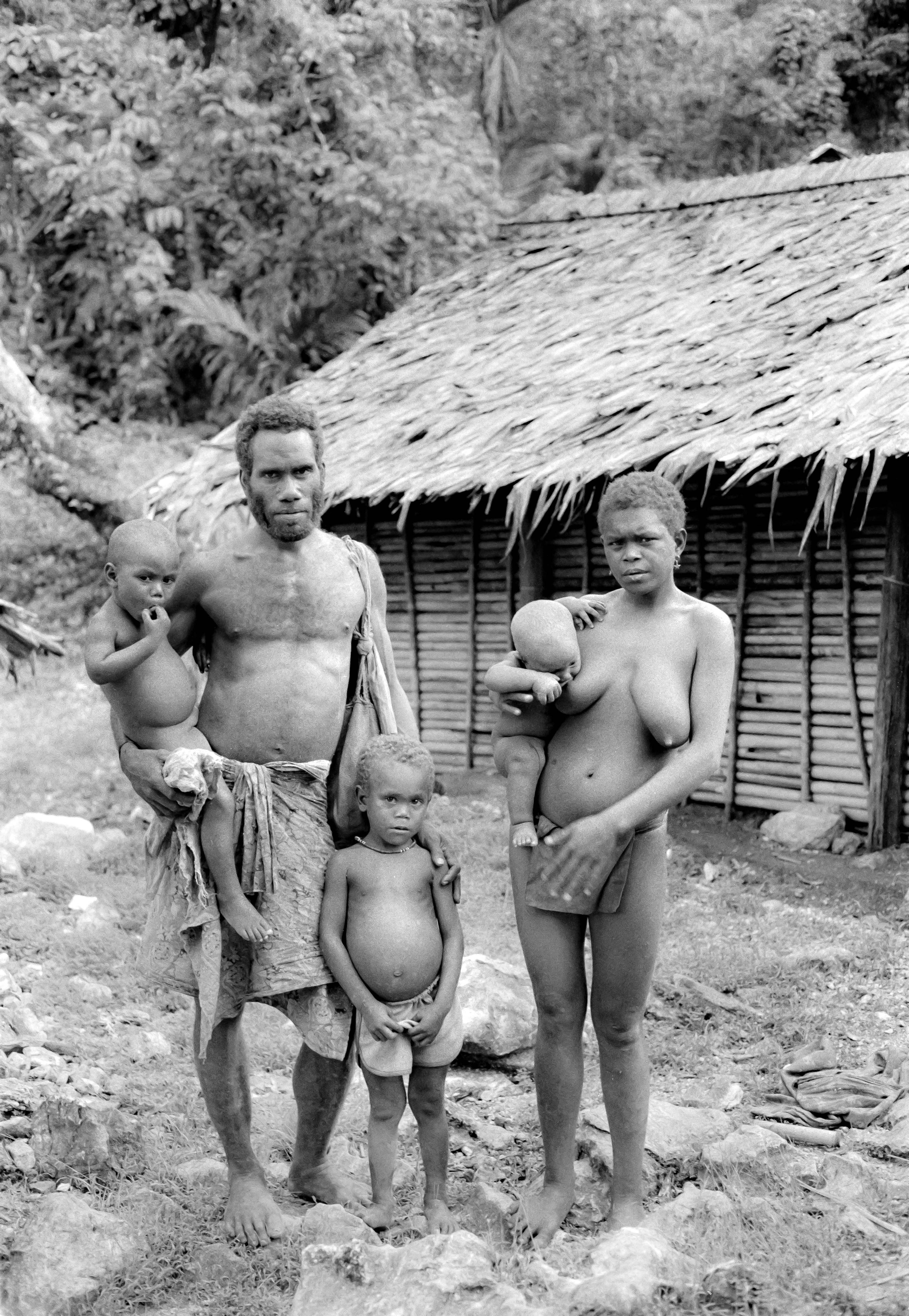 Naked tribal family