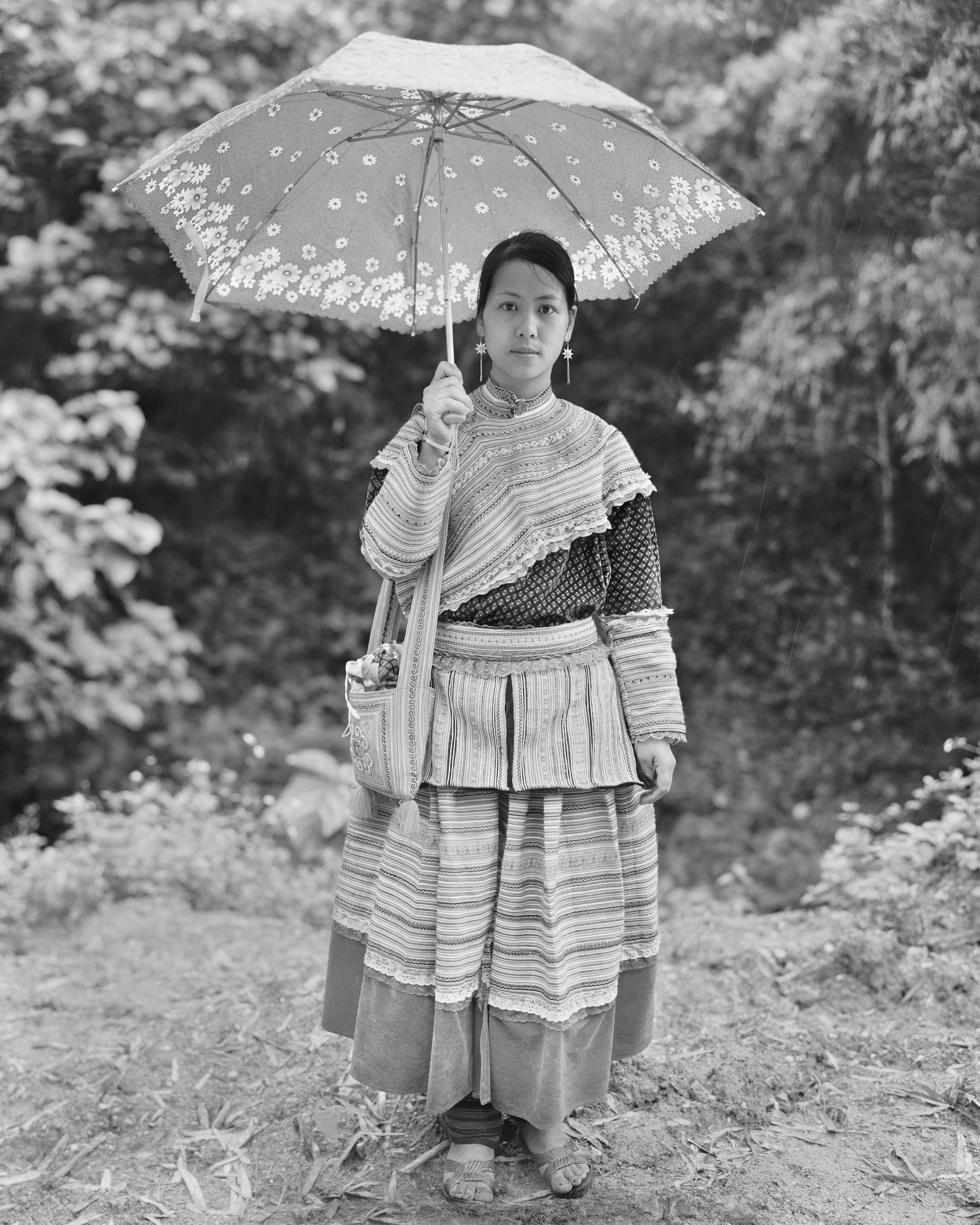 Lao Cai Woman with Umbrella in the Rain